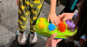 Three iC2 students and their caregivers attended a learning journey at the newly opened Punggol Regional Library on 26 May 2023.