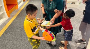 Three iC2 students and their caregivers attended a learning journey at the newly opened Punggol Regional Library on 26 May 2023.