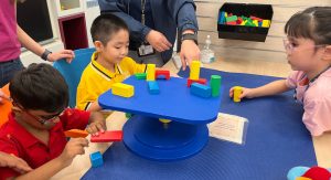 Three iC2 students and their caregivers attended a learning journey at the newly opened Punggol Regional Library on 26 May 2023.