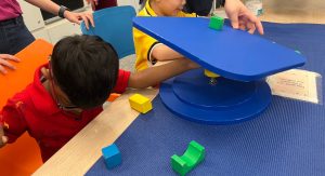 Three iC2 students and their caregivers attended a learning journey at the newly opened Punggol Regional Library on 26 May 2023.