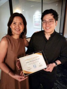 Dr. Audrey Looi presented Chef Nicholas Tam with a plaque as a Certificate of Appreciation.