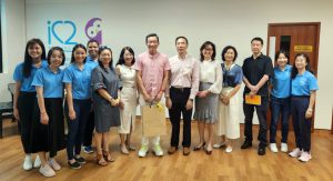 An ensemble photograph captured to commemorate Mr. Eric Chua's special visit to our organization.