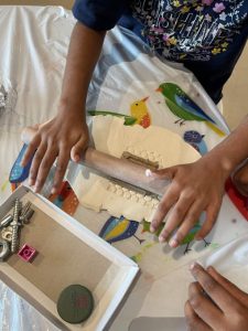 They created textures on it using different tools like Lego blocks, screws, bottle caps and many more, they cut and molded their final product by using a cookie cutter of their choice.