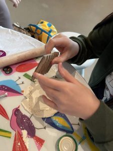 They created textures on it using different tools like Lego blocks, screws, bottle caps and many more, they cut and molded their final product by using a cookie cutter of their choice.