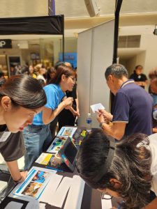 We had a range of fun activities catering to all ages (decode the code, a braille activity; tactile tic tac toe; picture search using handheld magnifier) to demonstrate how our students with visual impairment can access information and learn.