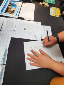 We had a range of fun activities catering to all ages (decode the code, a braille activity; tactile tic tac toe; picture search using handheld magnifier) to demonstrate how our students with visual impairment can access information and learn.