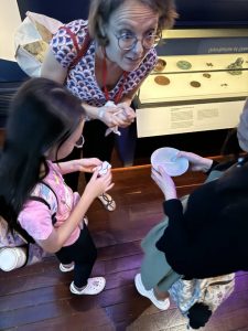 This experience was made inclusive and accessible with tactile resources, allowing our students to feel the intricate details of artifacts and connect with the stories woven into each piece.