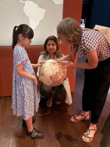 iC2 students and their families were treated to an enriching guided touch tour at the Asian Civilisations Museum’s captivating exhibition, “Manila Galleon: From Asia to Americas”.
