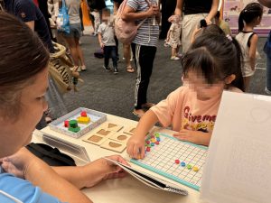 A young visitor is engaging in an activity