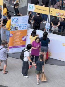 Teacher Lay Hong greets one of the iC2 student and his mother