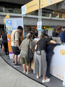 Visitors came to iC2 booth to learn about the "Decode the Quotes" game and enthusiastically took the opportunity to try the activity themselves