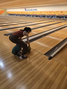 One of our beneficiaries and his mother had a fun evening of strikes, spares, and community spirit.